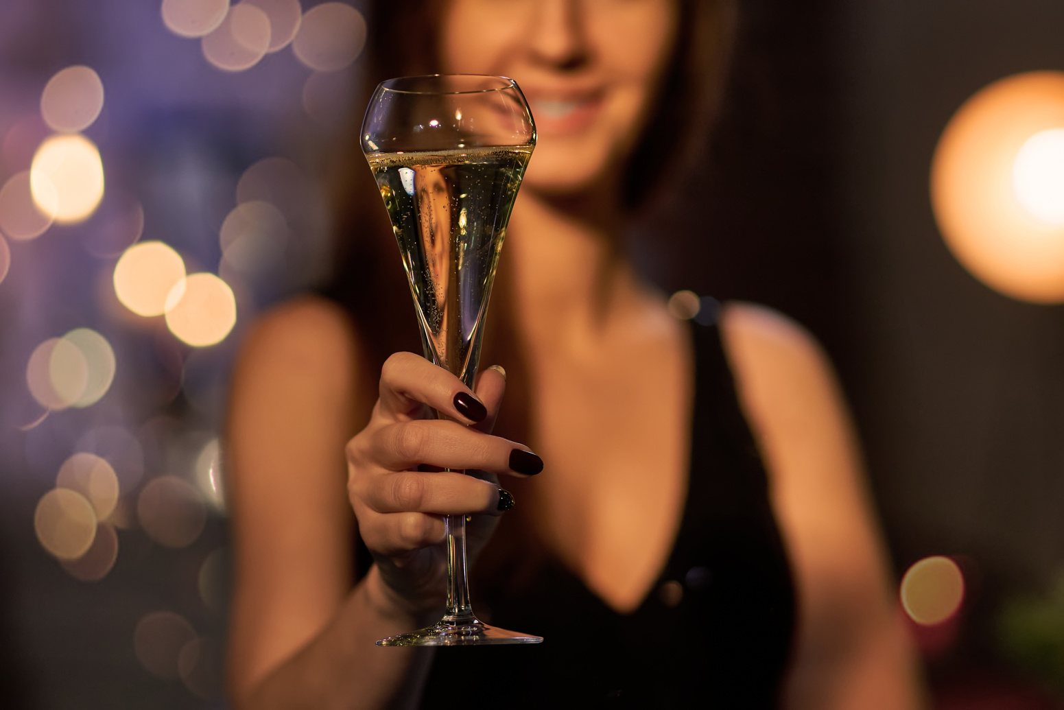 Woman Toasting with Champagne 